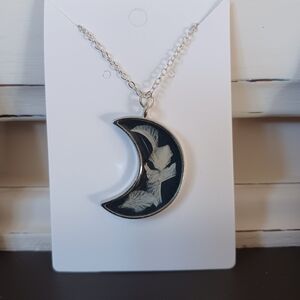 Elegant Silver Crescent Moon Necklace with Bird Motif